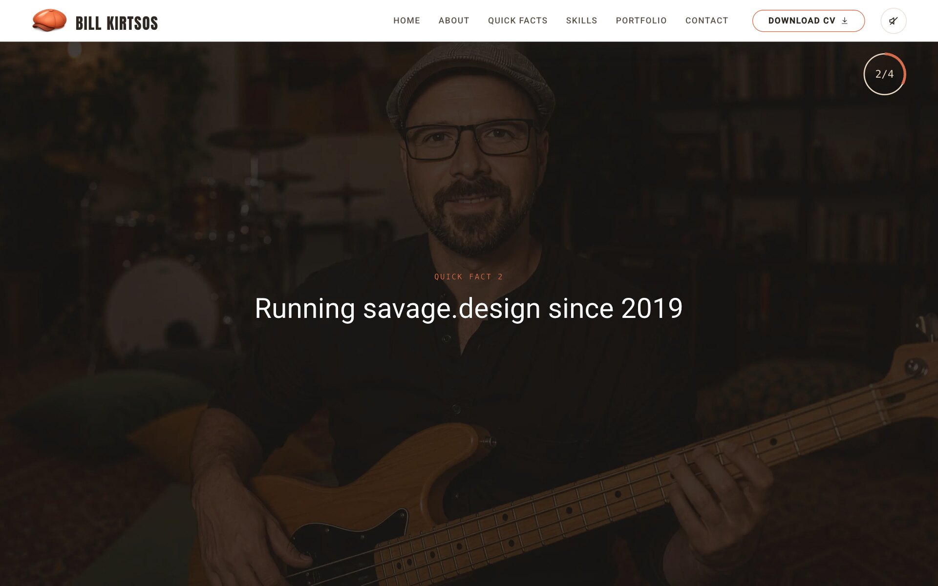 A dark, full-width photograph of Bill Kirtsos in glasses and a flat cap playing a bass guitar, dimmed behind white text: the small terracotta label "Quick fact 2" above "Running savage.design since 2019" in large type, with a progress ring reading 2/4 in the top right corner.