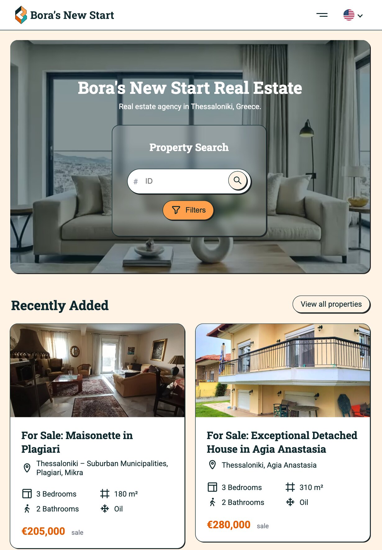 The home page on a tablet: the logo, a menu button and the flag picker, the same living-room hero with its headline and "Property Search" panel, then "Recently Added" with two listing cards: "For Sale: Maisonette in Plagiari", 3 bedrooms, 2 bathrooms, 180 m², oil heating, €205,000, and "For Sale: Exceptional Detached House in Agia Anastasia", 3 bedrooms, 2 bathrooms, 310 m², oil heating, €280,000.