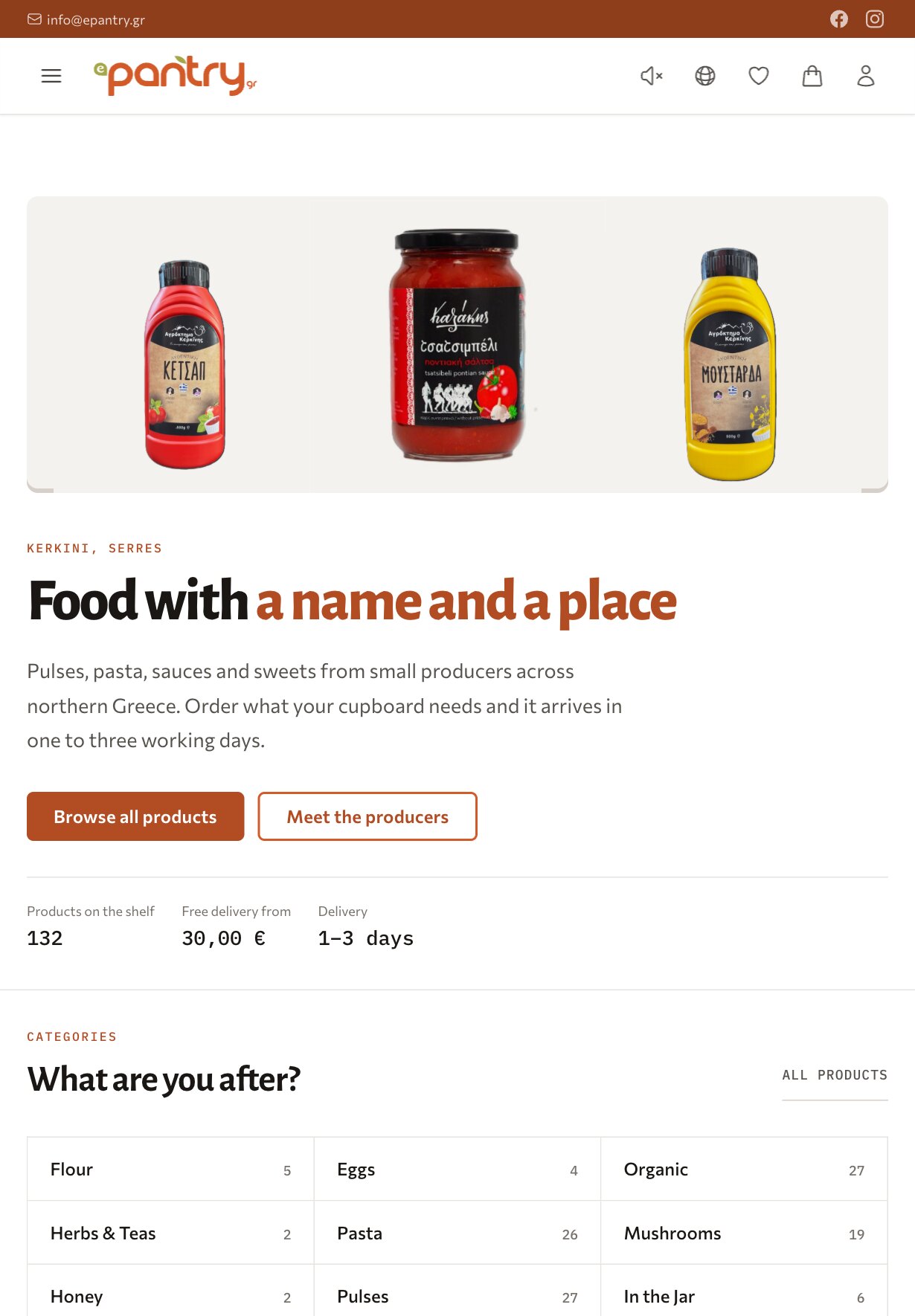 The home page on a tablet: the rust-coloured bar, a header with a menu button, the logo and icons for sound, language, wishlist, bag and account, then the panel of three products across the width, the "Kerkini, Serres" label, the heading on one line, the introduction, the two buttons and the three figures; below, the heading "What are you after?" with an "All products" link and a ruled grid of categories, each with its product count: Flour 5, Eggs 4, Organic 27, Herbs & Teas 2, Pasta 26, Mushrooms 19, Honey 2, Pulses 27, In the Jar 6.