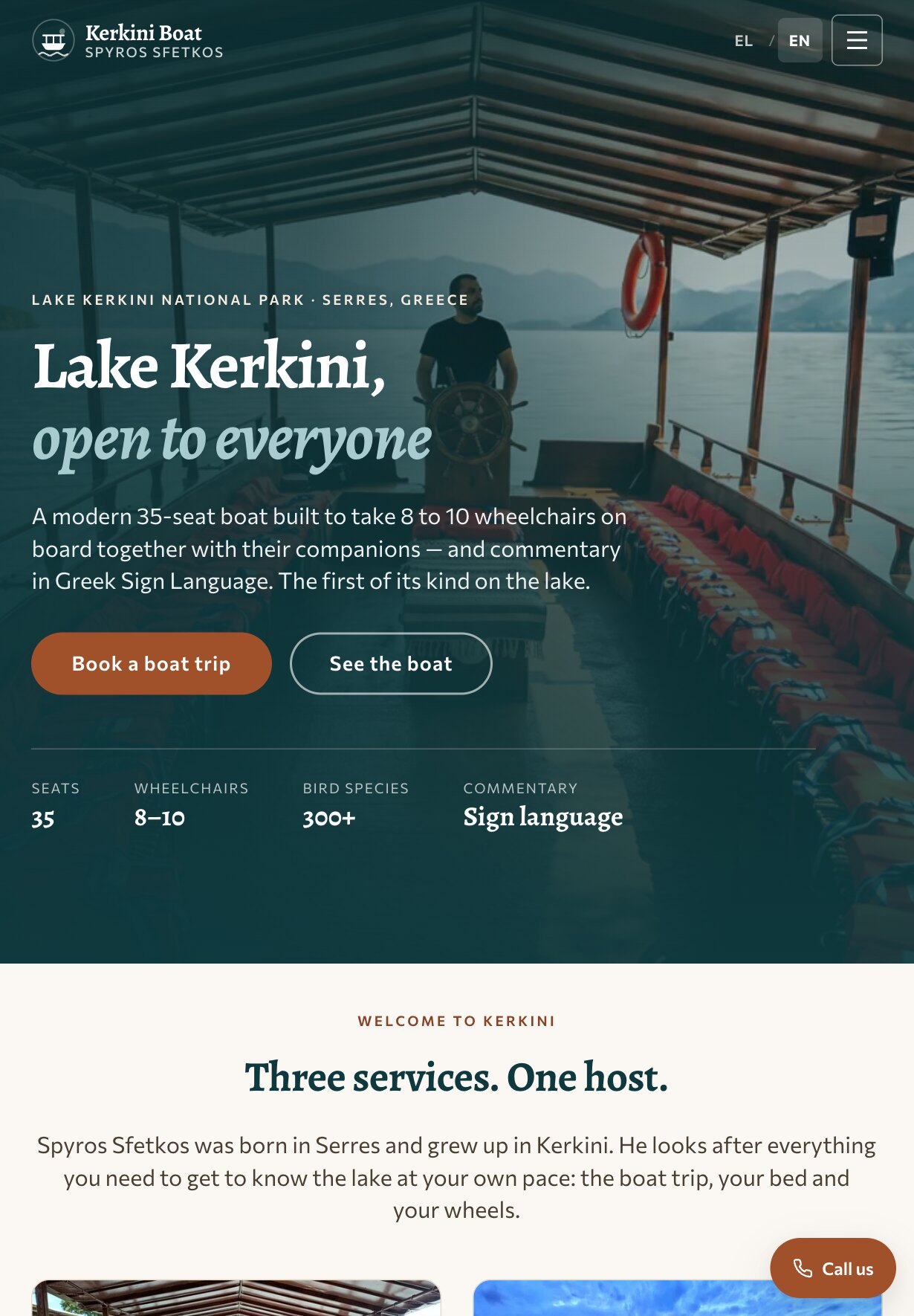 平板上的首页:标题“Lake Kerkini, open to everyone”压在调暗的甲板照片上,船长在掌舵;下方是介绍文字、并排的两个按钮和一行四项数据;首屏之下是“Three services. One host.”板块的开头、其介绍文字和两张卡片的顶部,右下角悬浮着一个铁锈色的“Call us”按钮。